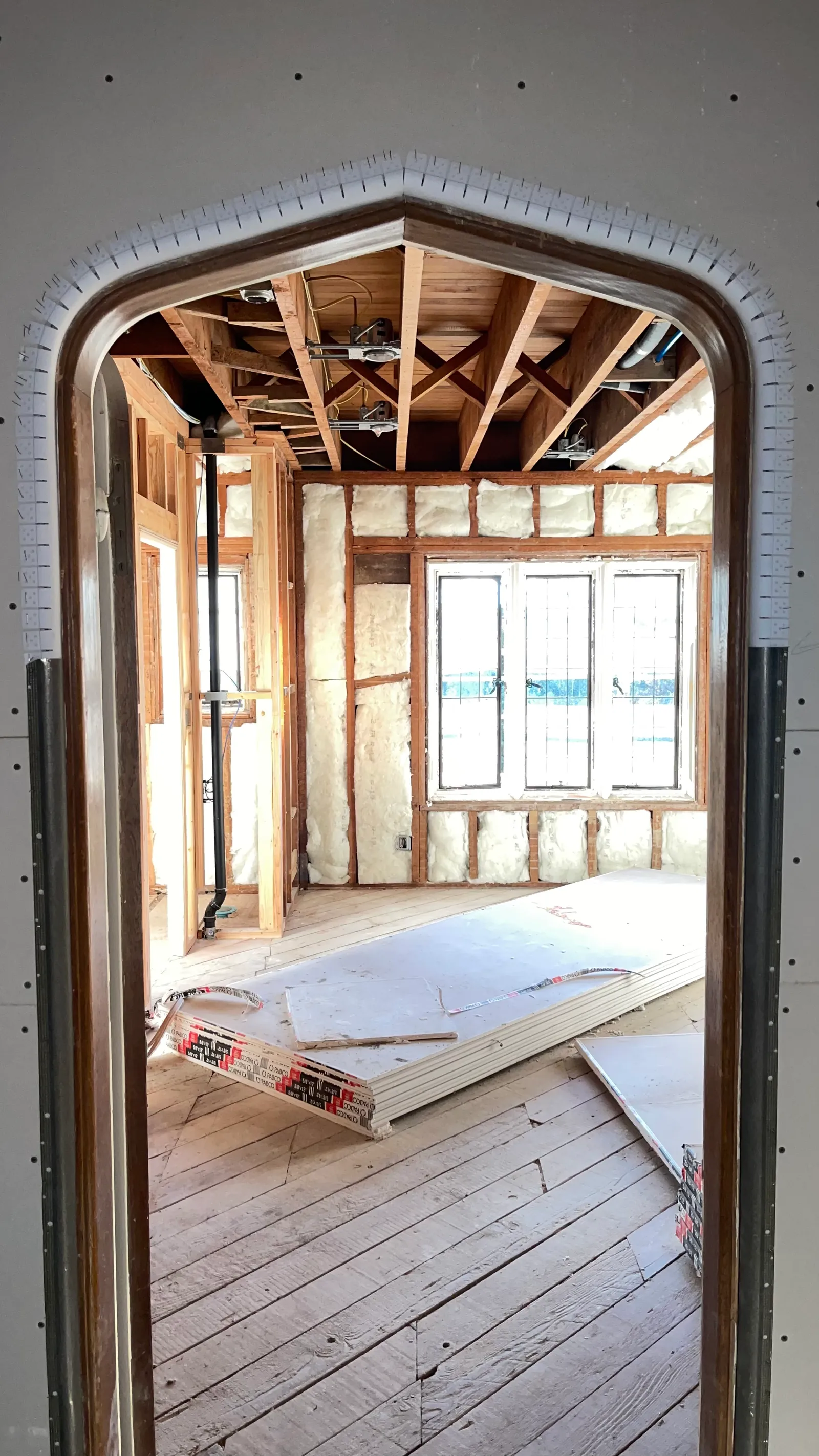 Plaster archway finished into new drywall
