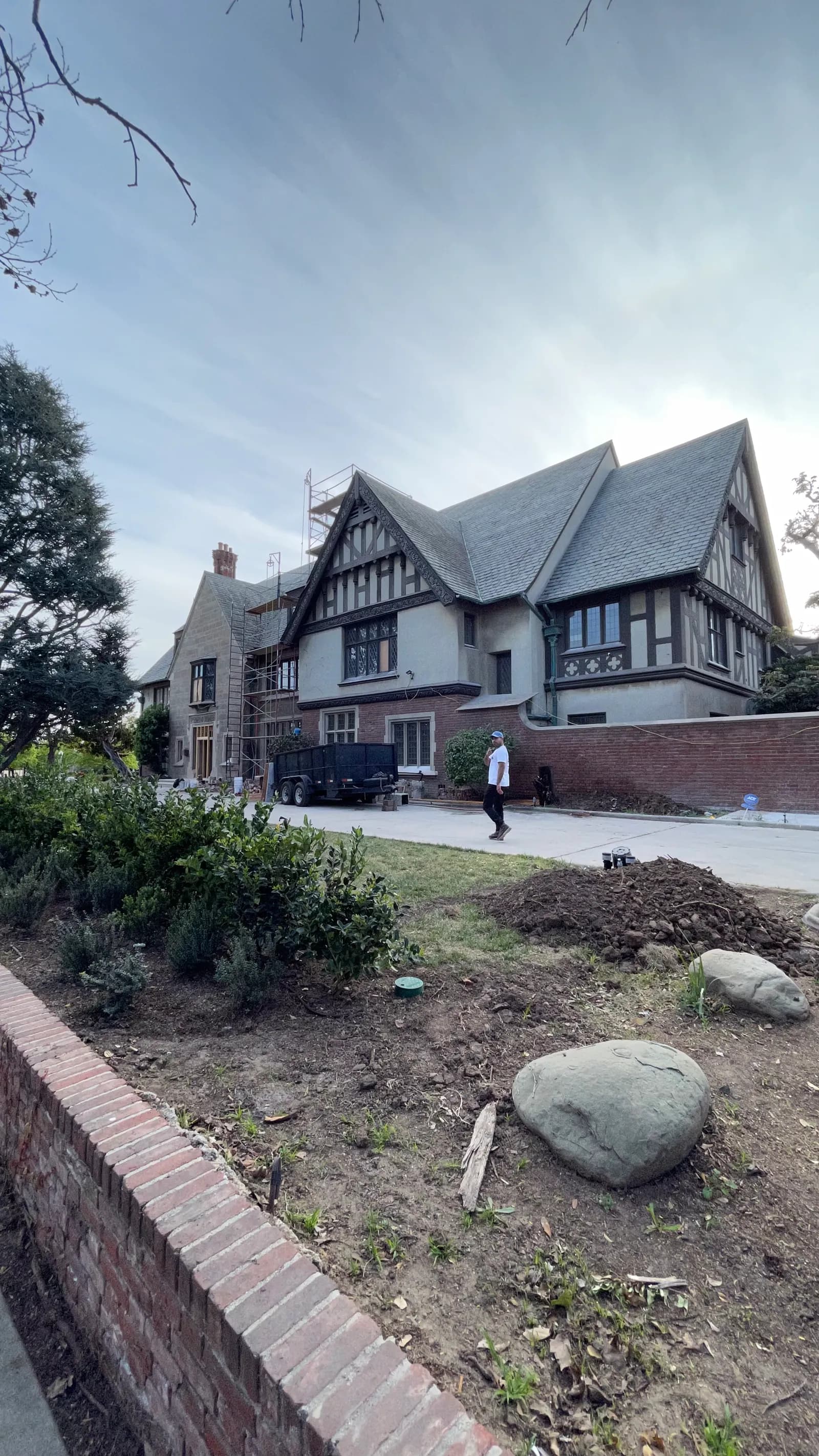 Tudor front elevation under scaffold during the renovation