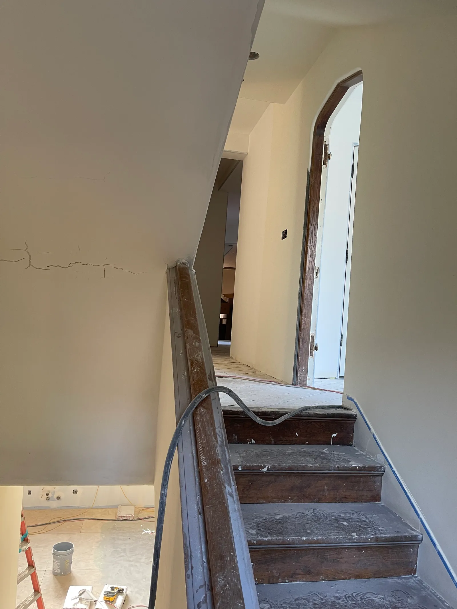 Stairwell walls finished around original woodwork