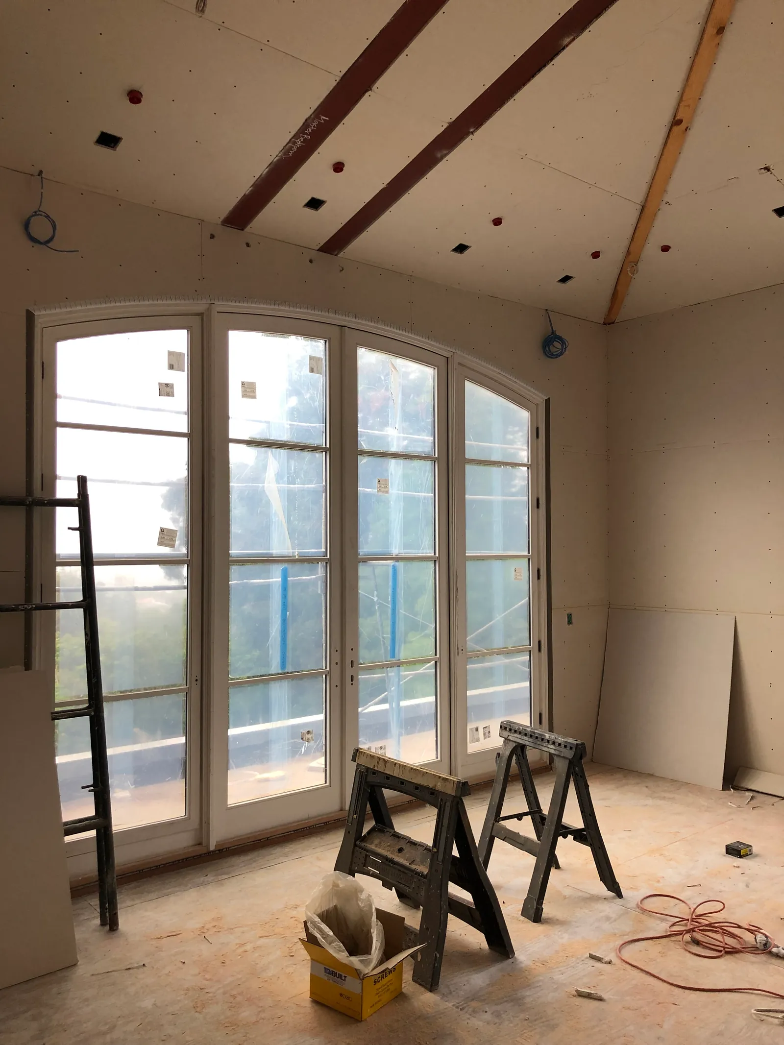Room boarded around french doors