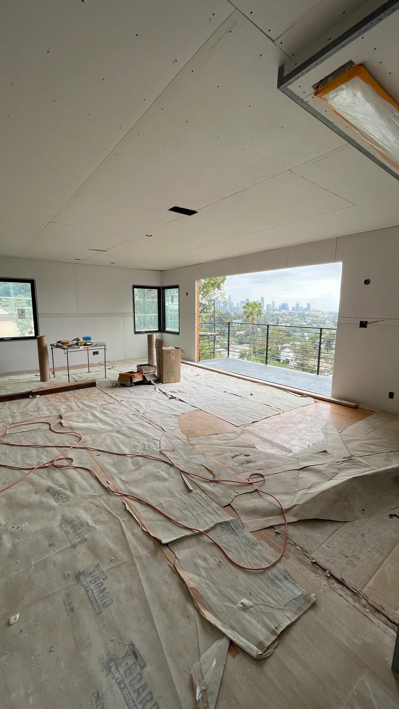 Boarded ceiling and walls with downtown skyline visible
